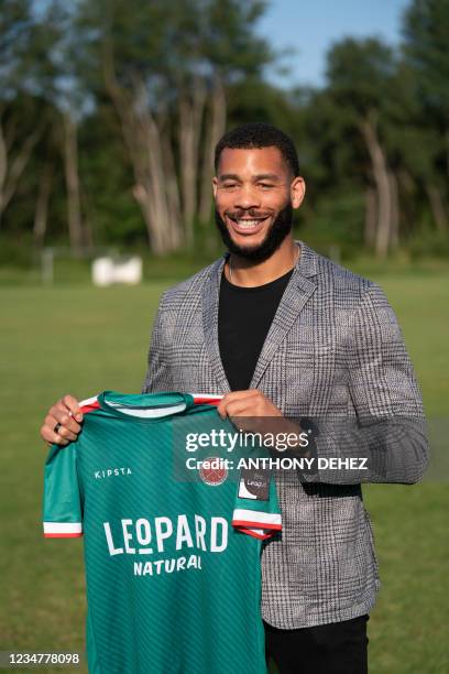 Virton's new secretary-general Oguchi Onyewu poses after a press conference of 1B Proximus League soccer club RE Virton, to present their new...