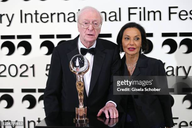Sir Michael Caine is awarded with the Crystal Globe for Outstanding Contribution to World Cinema, and his wife Lady Shakira Caine at the 55th Karlovy...
