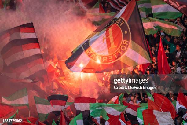 Supporters of Feyenoord with Flags and Fireworks prior to the UEFA Conference League Play-Off Leg One Match between Feyenoord and Elfsborg at De Kuip...