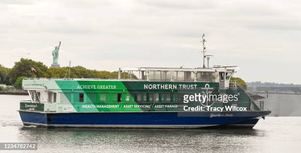 Spectators arrive on a ferry during the second round of THE NORTHERN TRUST at Liberty National Golf Club on August 20, 2021 in Jersey City, New...