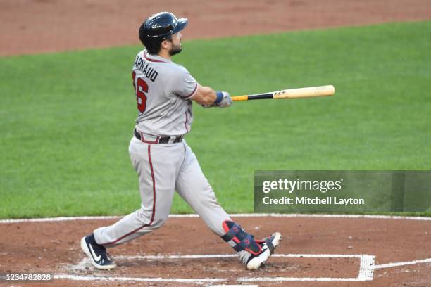 Travis d'Arnaud of the Atlanta Braves hits a two-run home run in the second inning during a baseball game against the Baltimore Orioles at Oriole...