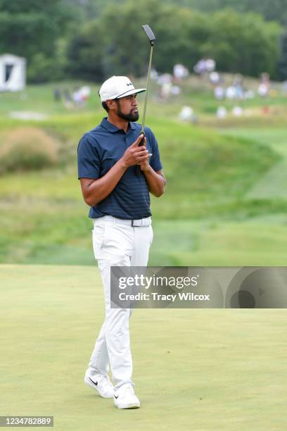 Tony Finau lifts his putter at the 17th hole during the second round of THE NORTHERN TRUST at Liberty National Golf Club on August 20, 2021 in Jersey...