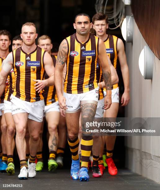 Shaun Burgoyne of the Hawks walks up the race for his final match during the 2021 AFL Round 23 match between the Richmond Tigers and the Hawthorn...