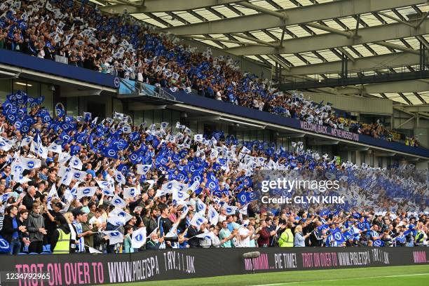 Supporters fill the stands ahead of the English Premier League football match between Brighton and Hove Albion and Watford at the American Express...