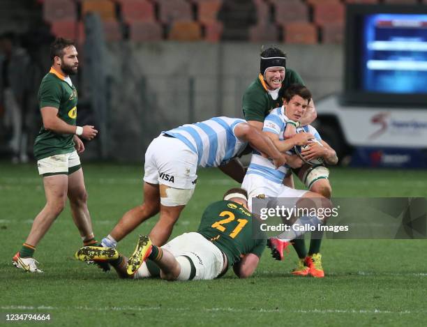 Nicolaas Janse van Rensburg of South Africa makes the tackle during the Castle Lager Rugby Championship match between South Africa and Argentina at...