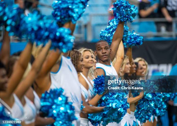 Carolina Panthers cheerleaders are seen before the first half of a NFL preseason game at Bank of America Stadium on August 21, 2021 in Charlotte,...