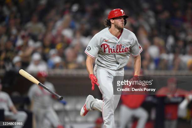 Aaron Nola of the Philadelphia Phillies hits a double during the eighth inning of a baseball game against the San Diego Padres at Petco Park on...