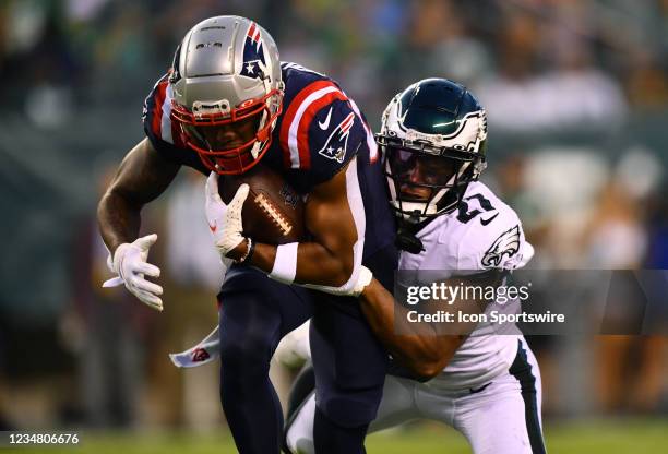 Philadelphia Eagles CB Zech McPhearson tackles New England Patriots WR Kendrick Bourne in the first half during the game between the New England...