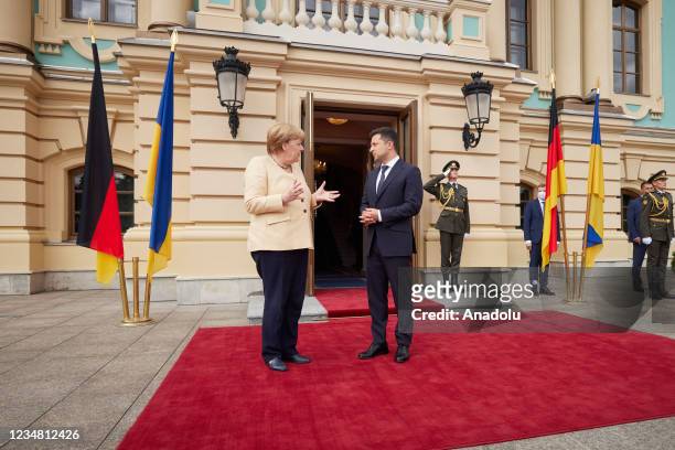 German Chancellor Angela Merkel being welcomed by Ukrainian President Volodymyr Zelensky ahead of a meeting in Kiev, Ukraine on August 22, 2021.