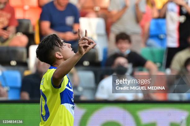Juventus' Argentine forward Paulo Dybala celebrates after scoring a goal during the Italian Serie A football match between Udinese and Juventus at...