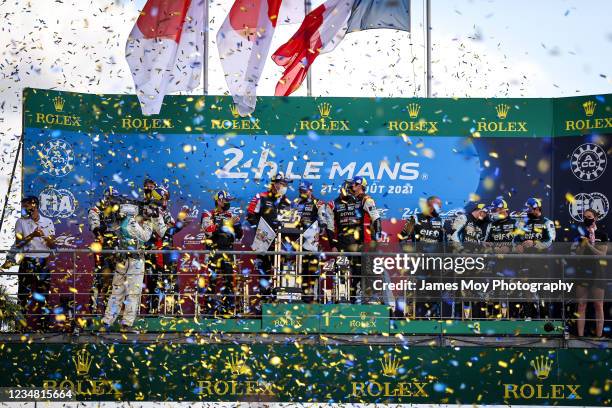 The podium : Kazuki Nakajima, Brendon Hartley, and Sebastien Buemi Toyota Gazoo Racing, second; Mike Conway; Kamui Kobayashi; Jose Maria Lopez Toyota...