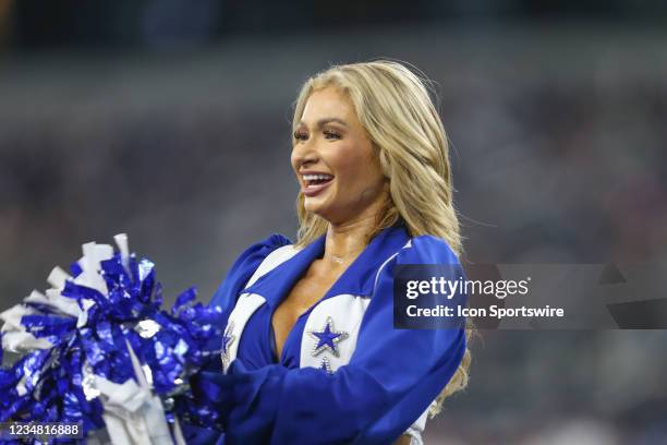 Dallas Cowboys Cheerleader performs during the game between the Dallas Cowboys and the Houston Texans on August 21, 2021 at AT&T Stadium in...