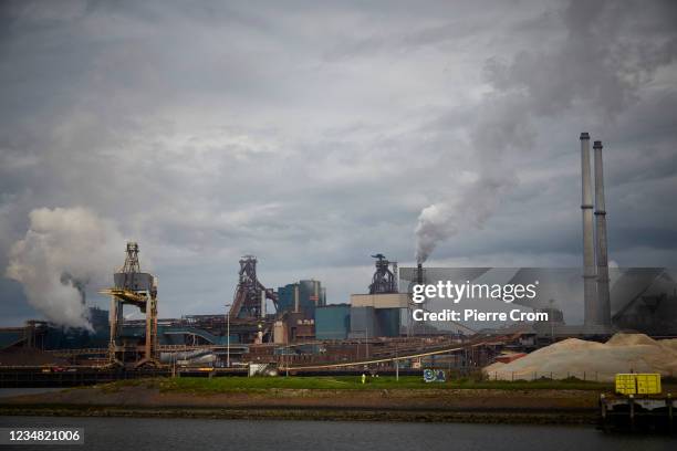 View of the Tata Steel plant from a sluice on August 22, 2021 in Ijmuiden. The Tata steel plant is under investigation by the Dutch Public...