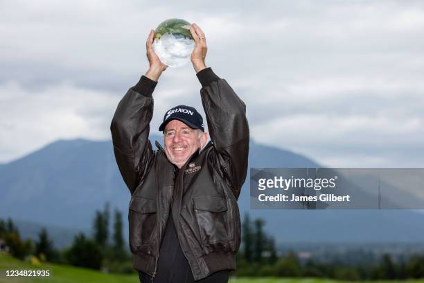 Rod Pampling of Australia poses with the trophy after winning the final round of the Boeing Classic at The Club at Snoqualmie Ridge on August 22,...