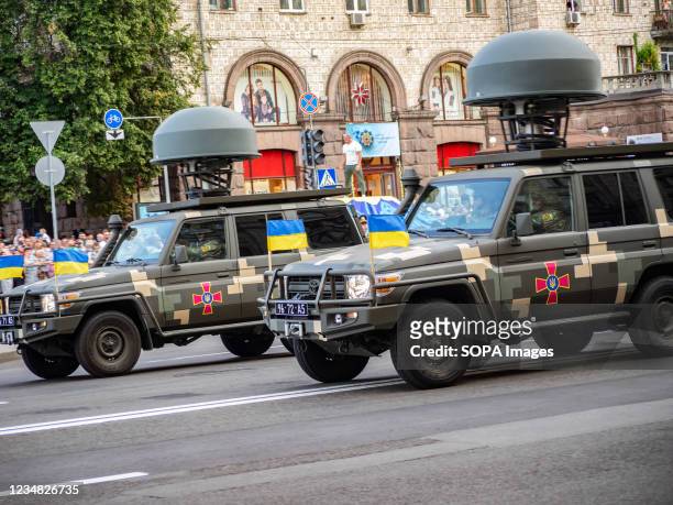 Ukrainian military vehicles radio electronic warfare drive in formation during the rehearsal of the military parade which will take place on the...