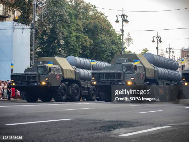 Ukrainian mobile missile launch systems drive during the rehearsal of the military parade which will take place on the Independence Day.