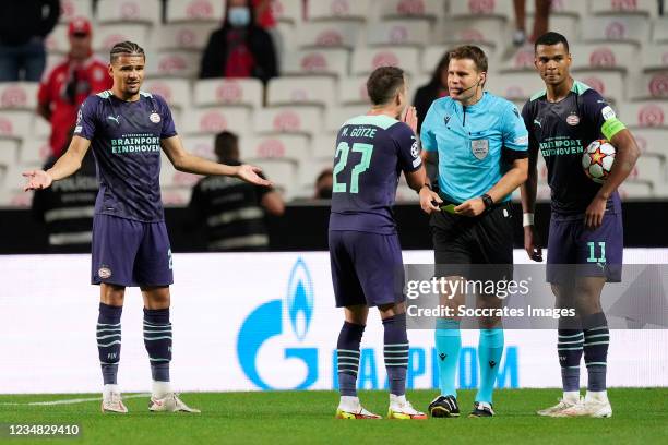 Armando Obispo of PSV, Mario Gotze of PSV, Referee Felix Brych, Cody Gakpo of PSV during the UEFA Champions League match between Benfica v PSV at the...