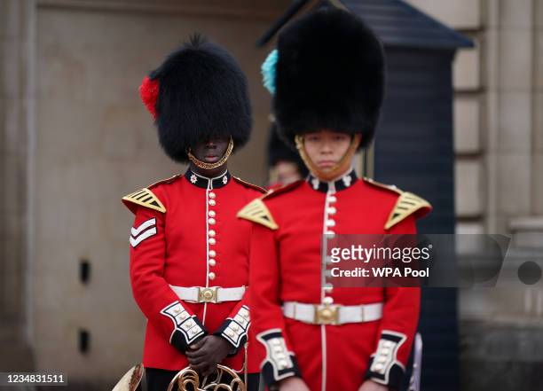 Member of the 1st Battalion the Coldstream Guards takes part in the Changing of the Guard, which is taking place for the first time since the start...