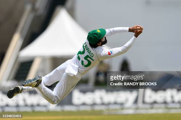 Fawad Alam of Pakistan takes the catch to dismiss Jermaine Blackwood of West Indies during day 4 of the 2nd Test between West Indies and Pakistan at...