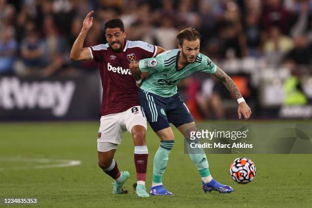 Pablo Fornals of West Ham United tangles with James Maddison of Leicester City during the Premier League match between West Ham United and Leicester...