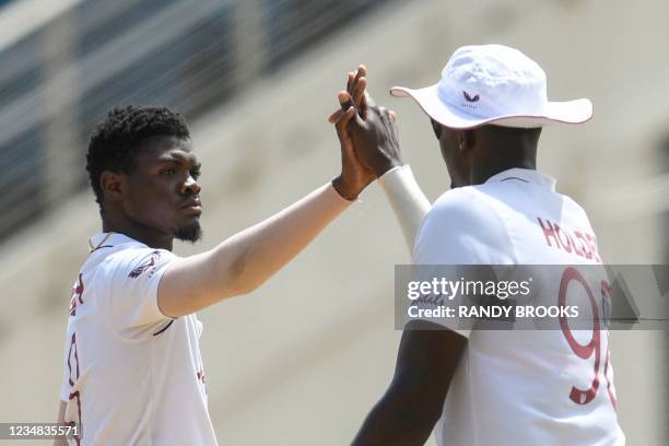 Alzarri Joseph of West Indies celebrates the dismissal of Abid Ali of Pakistan during day 4 of the 2nd Test between West Indies and Pakistan at...