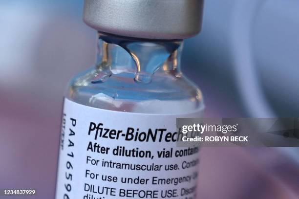 Vial of Pfizer-BioNTech Covid-19 vaccine is seen at a pop up vaccine clinic in the Arleta neighborhood of Los Angeles, California, August 23, 2021. -...