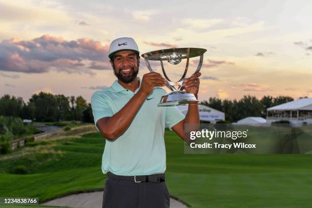 Tony Finau poses with the trophy after winning in a playoff during the weather delayed final round of THE NORTHERN TRUST at Liberty National Golf...