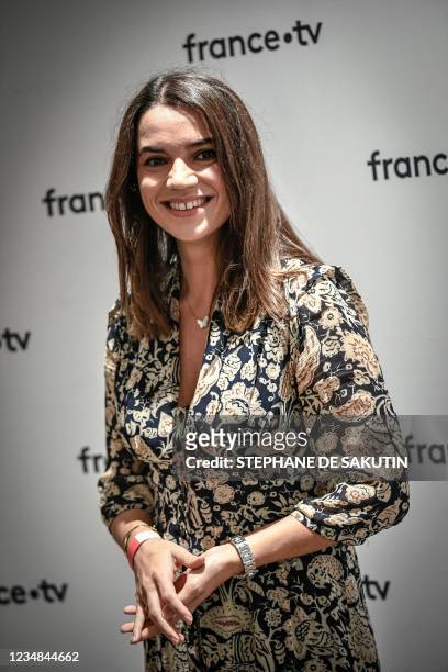French public broadcaster France Televisions' journalist Cecile Gres poses prior to a press conference in Paris on August 24, 2021.