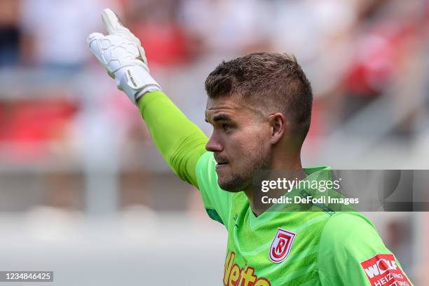 Goalkeeper Alexander Meyer of SSV Jahn Regensburg gestures during the Second Bundesliga match between SSV Jahn Regensburg and FC Schalke 04 at...