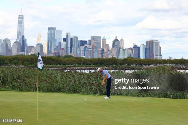 Cameron Tringale of the United States putts on the 14th green during the final round of the Northern Trust golf tournament on August 23, 2021 at...