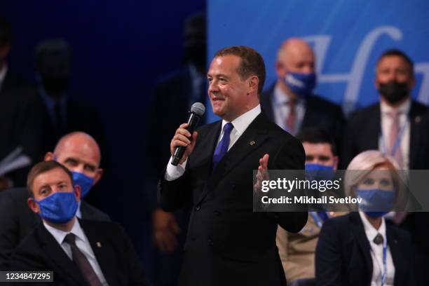 Russian Security Council Deputy Chairman and United Russia Party Leader Dmitry Medvedev smiles during the United Russia Party Congress, on August 24,...