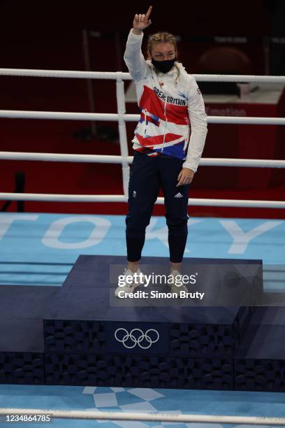 Summer Olympics: Great Britain Lauren Price victorious on medal stand after Women's Middleweight Final at Kokugikan Arena. Price wins gold. Price...