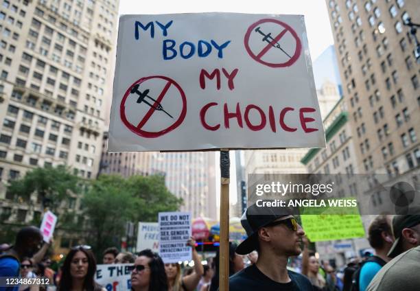 Protestors opposed to Covid-19 vaccine mandates and vaccine passports by the government rally at City Hall in New York City on August 25, 2021.