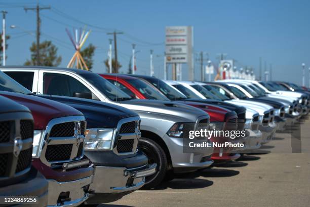New RAM trucks parked outside a Chrystler, Jeep, Dodge and RAM dealership in South Edmonton. On Wednesday, 24 August 2021, in Edmonton, Alberta,...