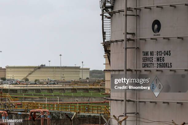 Storage tanks at the Reliance Industries Ltd. Oil refinery in Jamnagar, Gujarat, India, on Saturday, July 31, 2021. The Indian city of Jamnagar is a...
