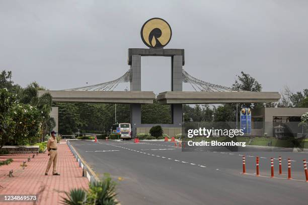 An entry gate to the Reliance Industries Ltd. Oil refinery in Jamnagar, Gujarat, India, on Saturday, July 31, 2021. The Indian city of Jamnagar is a...