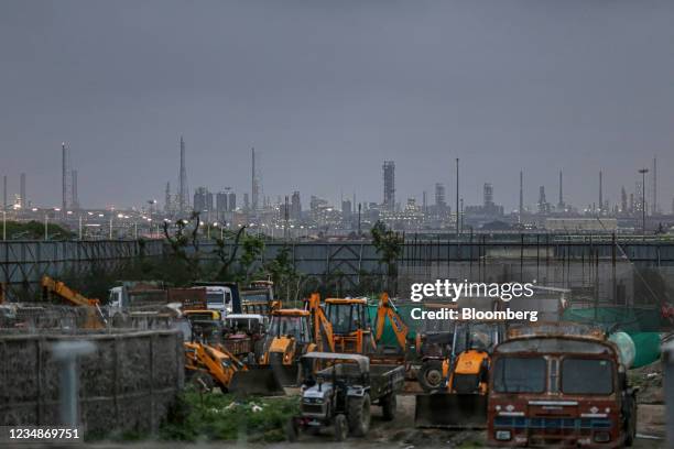 Construction equipment and machinery near the Reliance Industries Ltd. Oil refinery in Jamnagar, Gujarat, India, on Saturday, July 31, 2021. The...