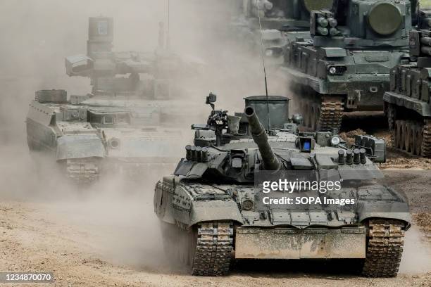Russian Army T-80 UE-1 tank and BMPT "Terminator" armored fighting vehicles are seen during the annual Army Games defense technology international...