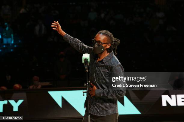 Legend, Crystal Robinson waves to the crowd after she is inducted into the New York Liberty Ring of Honor during halftime of the game between the New...