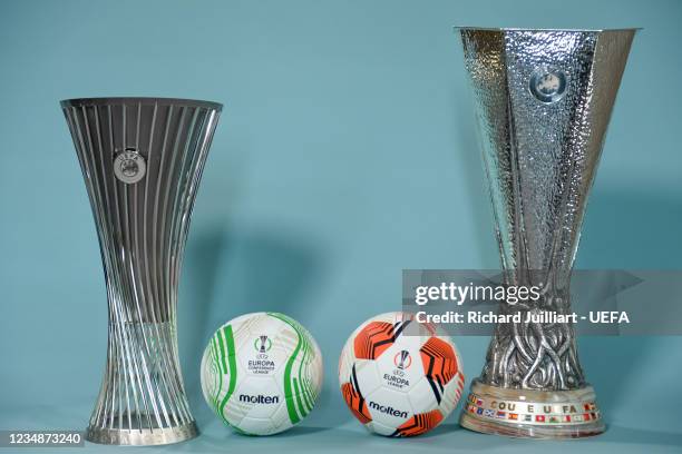 View of the UEFA Europa Conference League and UEFA Europa League trophy and official match ball ahead of the UEFA ECF Season Kick Off 2021/22 on...