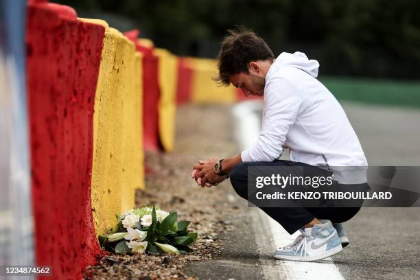 AlphaTauri's Formula One French driver Pierre Gasly pays tribute to late French racing driver Anthoine Hubert, after he placed a bunch of flowers at...