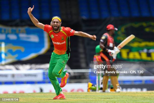 Imran Tahir of Guyana Amazon Warriors celebrates the dismissal of Darren Bravo of Trinbago Knight Riders during the 2021 Hero Caribbean Premier...