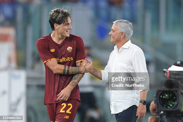 Nicolo Zaniolo of AS Roma shakes hands with Jose Mourinho manager of AS Roma leaving the pitch during the UEFA Conference League Play-Offs Second Leg...