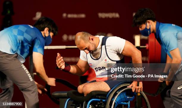 Great Britain's Ali Jawad after failing the third lift in the Men's -59 kg Final at the Tokyo International Forum during day three of the Tokyo 2020...