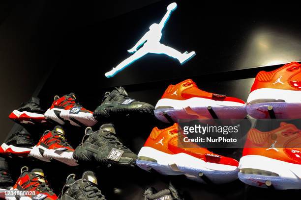 Air Jordan logo is seen in a shoe store in Krakow, Poland on August 26, 2021.