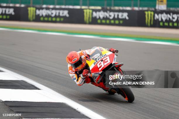 Honda Spanish rider Marc Marquez rides his motorbike during the second MotoGP free practice session of the motorcycling British Grand Prix at...