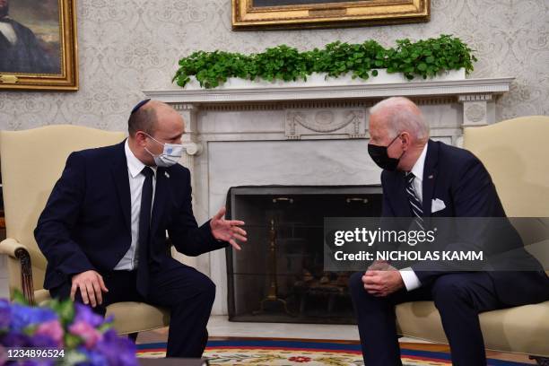 President Joe Biden meets with Israeli Prime Minister Naftali Bennett in the Oval Office of the White House in Washington, DC, on August 27, 2021.