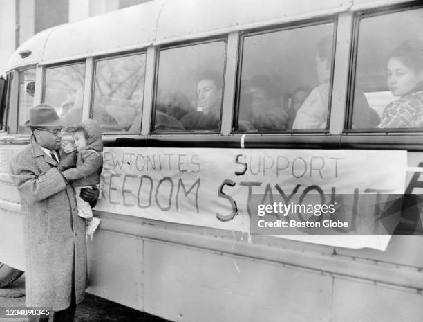 Boston, MA Hubert Jones watches Newton Students leave for the Freedom Schools on buses in Newton, MA on Feb. 26, 1964. Sponsored by the Massachusetts...