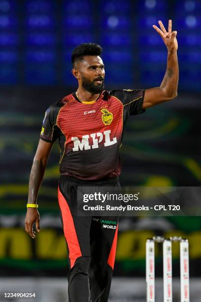 Isuru Udana of Trinbago Knight Riders celebrates taking three Barbados Royals wickets during the 2021 Hero Caribbean Premier League match 4 between...