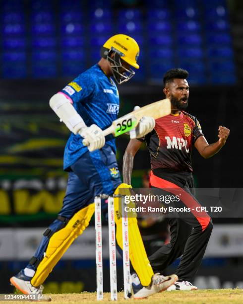 Isuru Udana of Trinbago Knight Riders celebrates the dismissal of Thisara Perera of Barbados Royals during the 2021 Hero Caribbean Premier League...